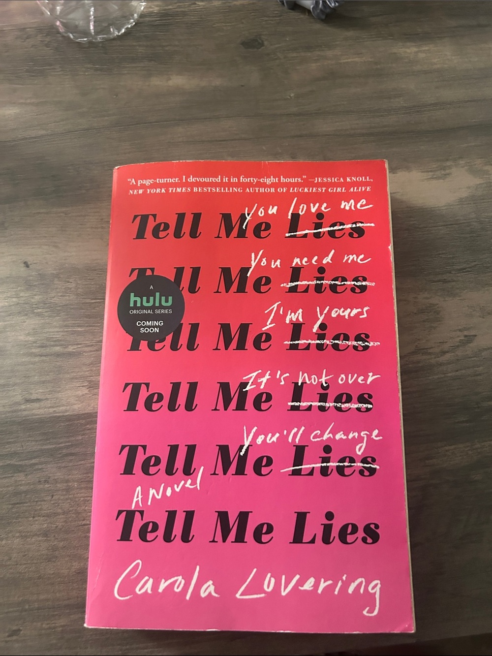 Tell Me Lies by Carola Lovering - Pink Paperback Novel